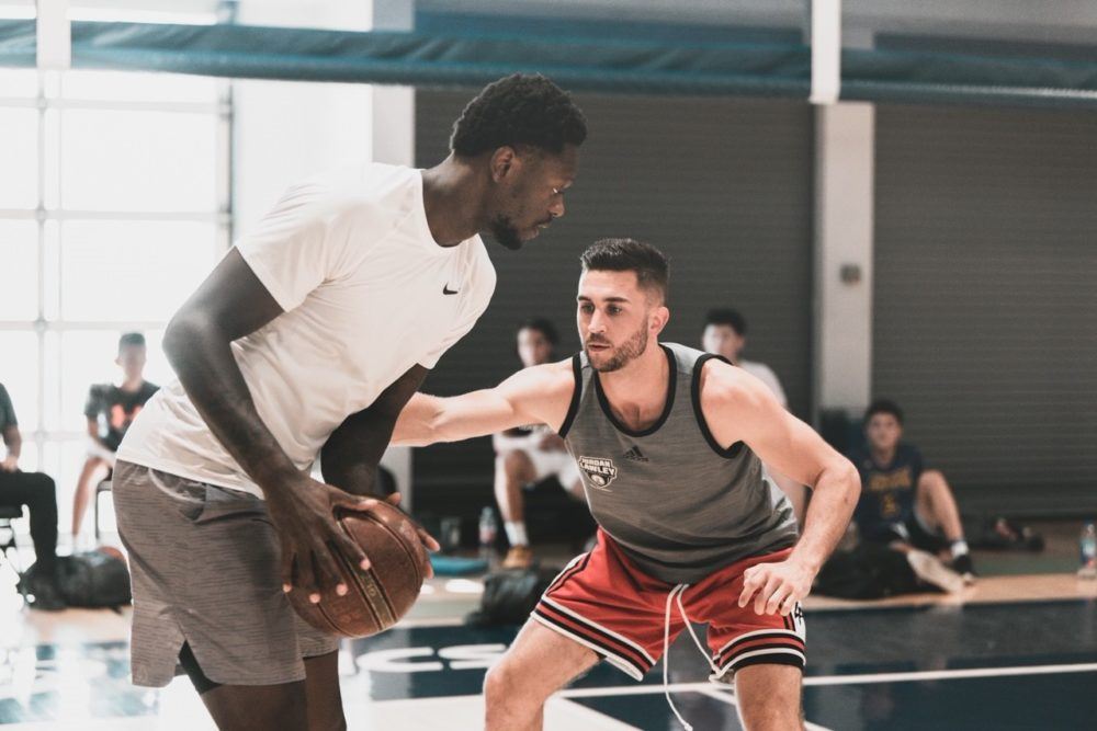 jordan lawleyplaying basketball with other patient
