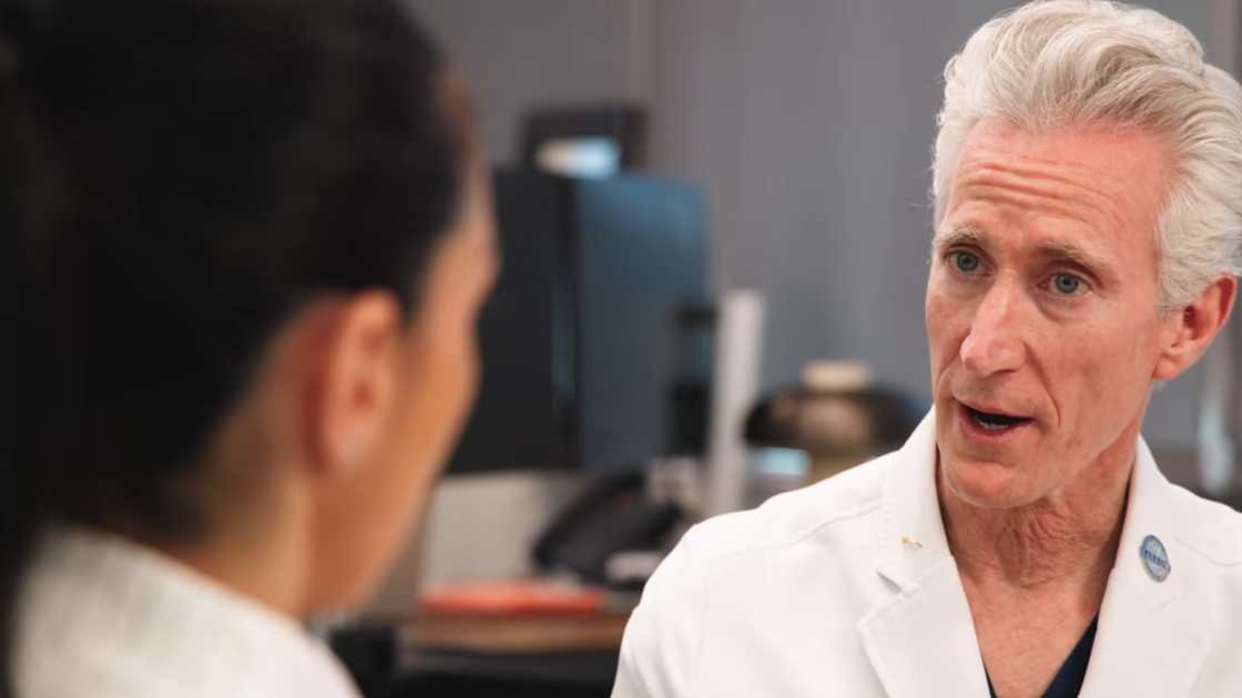 screenshot of Dr. Michael Lawton talking to Louisa Nicola on the TNE podcast.