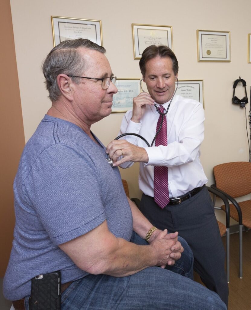 neuro-otologist terry fife examines a patient