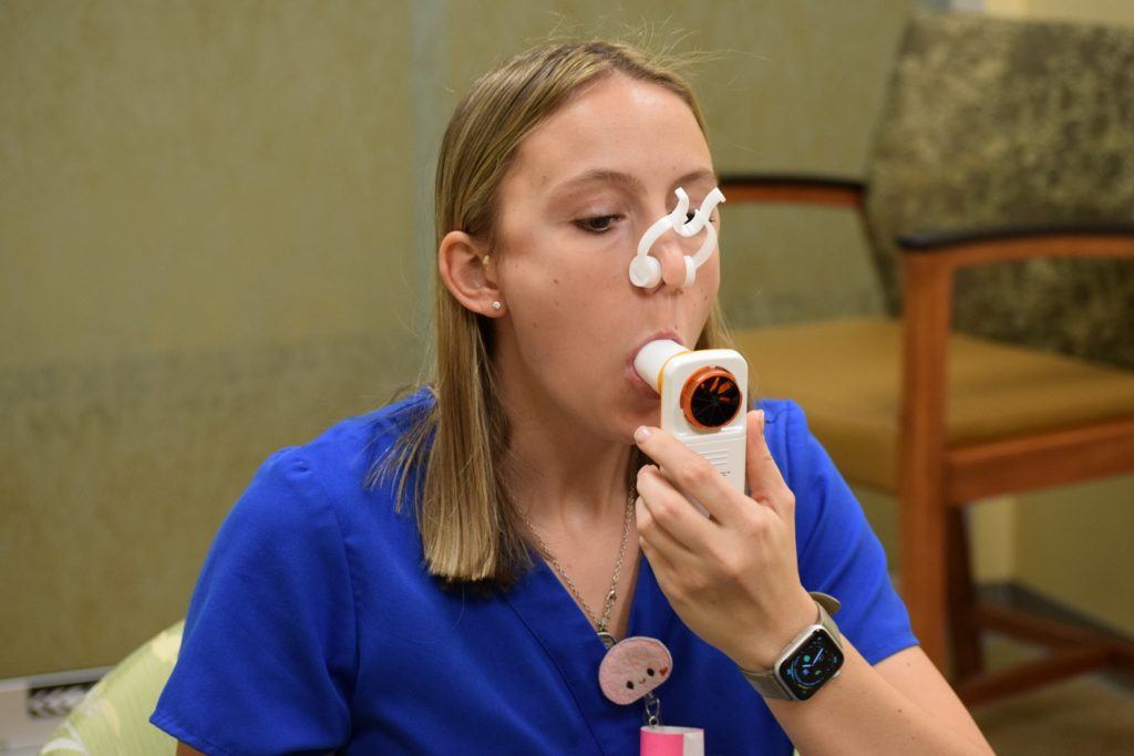 als clinical trial participant using a Bluetooth spirometer